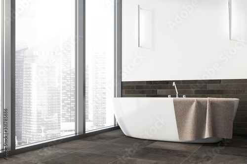 White and gray panoramic bathroom with tub