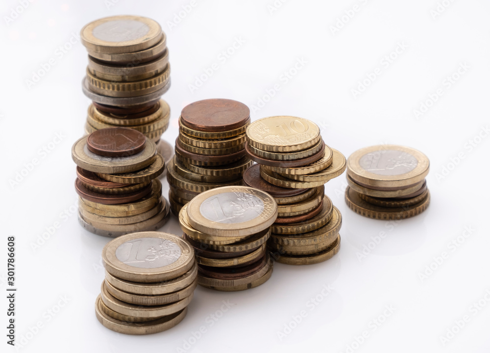 Rising stacks of euro coins, interest and growth concept Rising stacks of euro coins, interest and growth concept