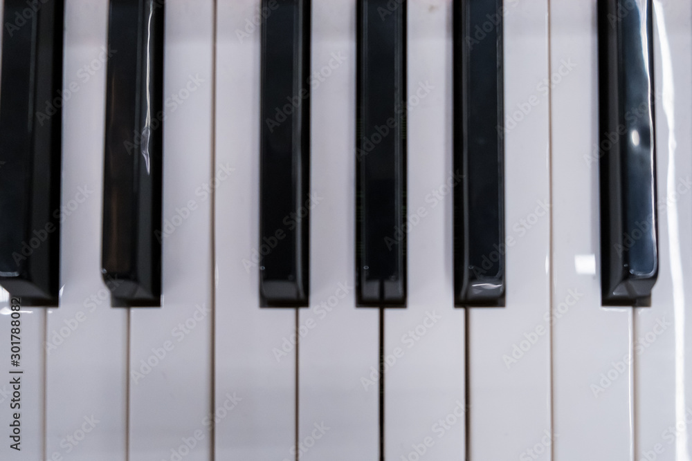 Piano keys viewed from above. Black and old keys Piano keys viewed from above. Black and old keys