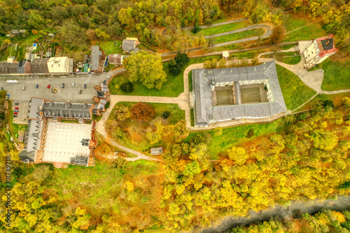 aerial shot of  two castle side by side in Hradec nad moravici one red and one bily in autumn colors