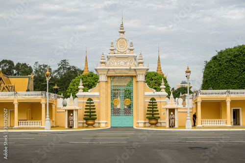 Phnom Penh / Cambodia - July 2019: A guard at the entrance of the Kings Palace Phnom Penh.