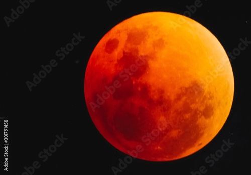 Fototapeta Naklejka Na Ścianę i Meble -  Red blood moon when the lunar eclipe in Thailand at 31 january 2018(taking photo at Nan,Thailand)