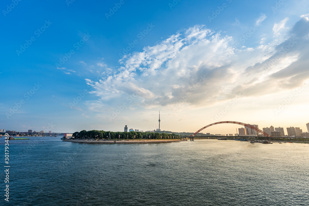 Naklejka premium aerial view of Wuhan city at night.Panoramic skyline and buildings beside yangtze river