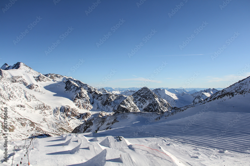 Ski resort in Austria. Beautiful mountain landscape with blue sky