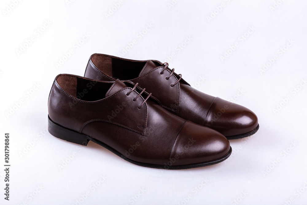 pair of dark shoes isolated on white background pair of dark shoes isolated on white background