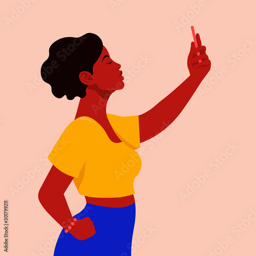 A beautiful African woman takes a selfie and holds her smartphone in her hand. A blogger is photographed for a social network. Vector flat illustration