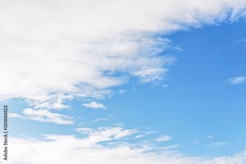 Beautiful white soft fluffy clouds on a blue sky background Beautiful white soft fluffy clouds on a blue sky background