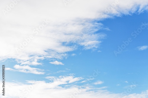 Beautiful white soft fluffy clouds on a blue sky background