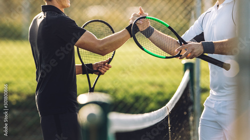 Tennis players shaking hands after the match © Jacob Lund