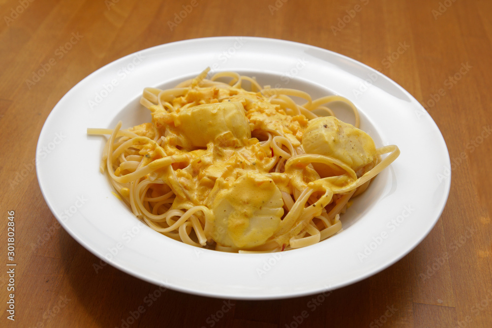 scallops with saffron sauce and pasta