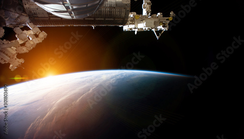 Fototapeta Naklejka Na Ścianę i Meble -  View of planet Earth from a space station window during a sunrise 3D rendering elements of this image furnished by NASA