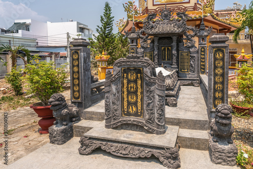 Nha Trang, Vietnam - March 11, 2019: Chua Loc Tho Buddhist temple, primary school and orphanage. grave and tombstones of Sister Thich Nu Dieu Y, founder of the orphanage. photo