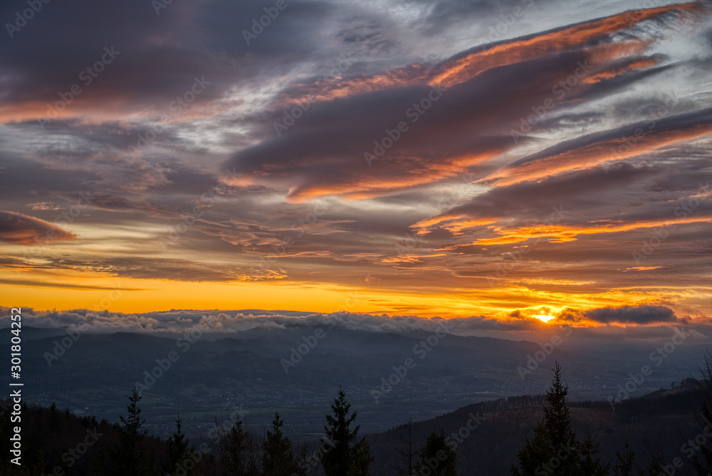 Beautiful sunrise in the mountains with clouds, Czech