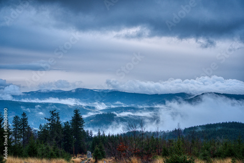 Fototapeta Naklejka Na Ścianę i Meble -  Beautiful view of clouds traveling over mountains in Beskydy, Czech