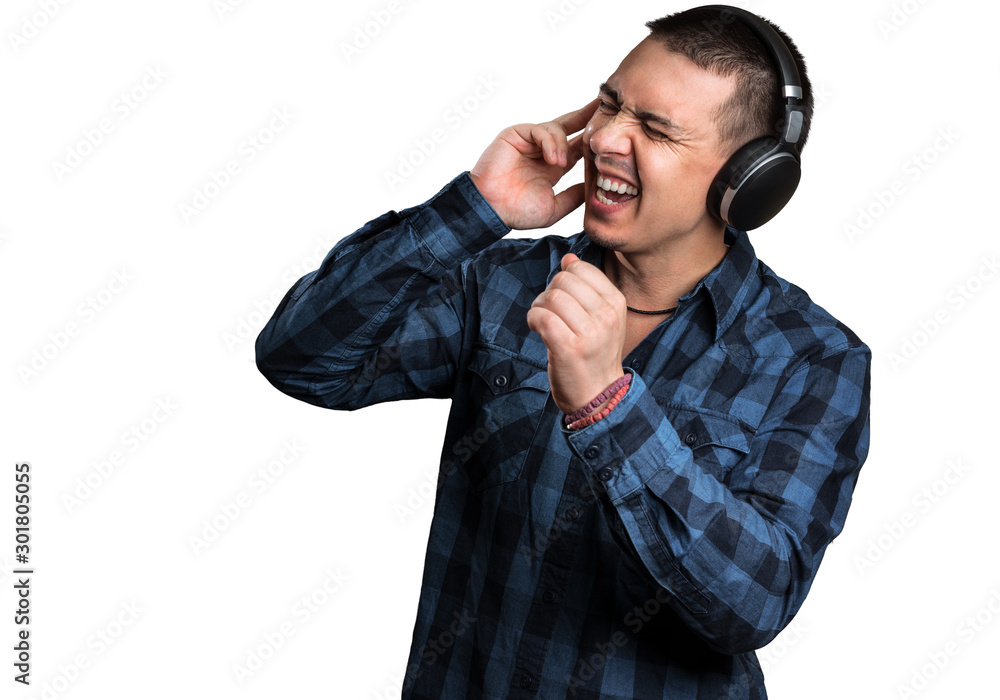 Young with headphones on white background, isolated. People, music, lifestyle. Digital lifestyle concept. Phone earphones. Wireless technology. Entertainment concept. Young with headphones on white background, isolated. People, music, lifestyle. Digital lifestyle concept. Phone earphones. Wireless technology. Entertainment concept.