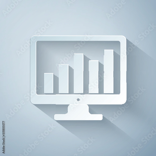 Paper cut Computer screen with financial charts and graphs icon isolated on grey background. Chart bars and financial analytics. Paper art style. Vector Illustration