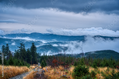 Fototapeta Naklejka Na Ścianę i Meble -  Beautiful view of clouds traveling over mountains in Beskydy, Czech