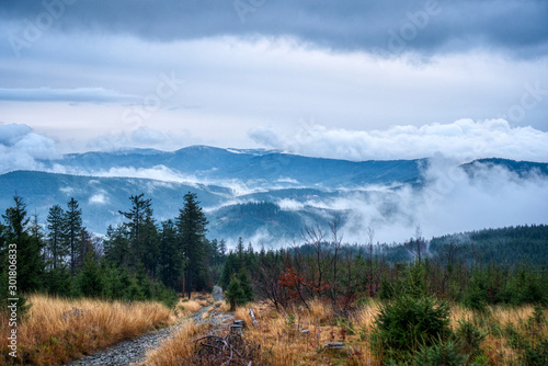 Fototapeta Naklejka Na Ścianę i Meble -  Beautiful view of clouds traveling over mountains in Beskydy, Czech