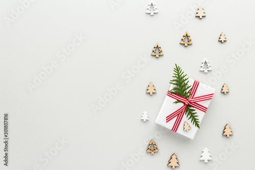 Christmas composition. Gift fir christmas tree top view background with copy space for your text. Flat lay.