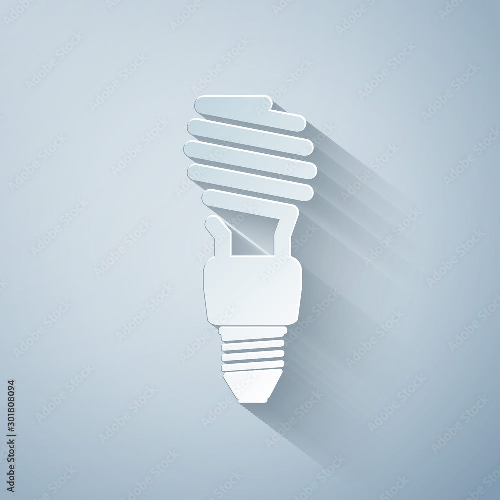 Paper cut Energy saving light bulb icon isolated on grey background. Paper art style. Vector Illustration Paper cut Energy saving light bulb icon isolated on grey background. Paper art style. Vector Illustration