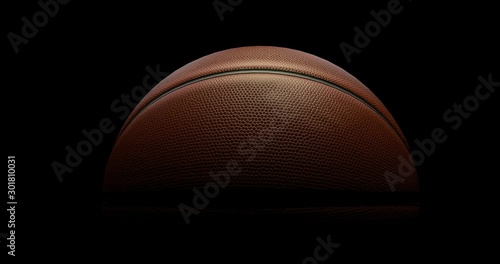 Basketball slowly rotate on black background