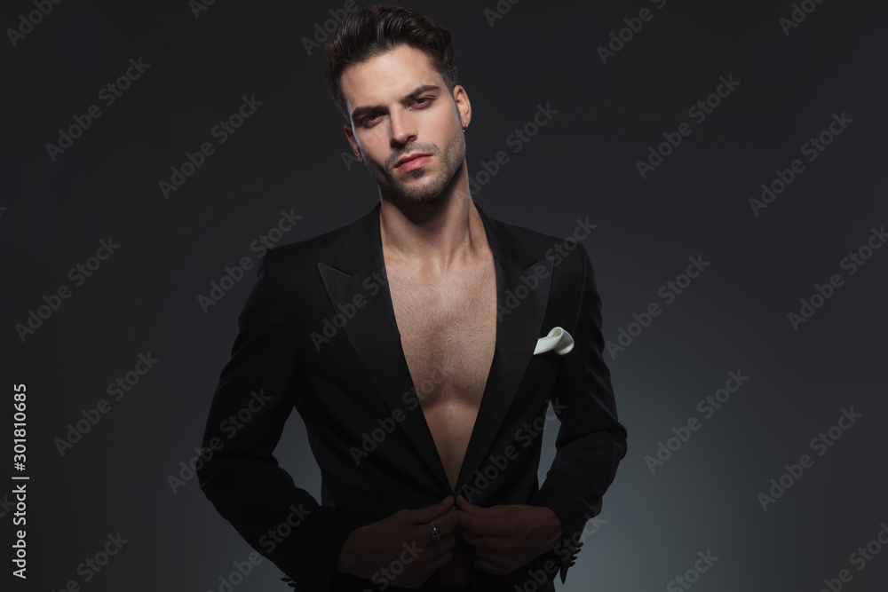 Fototapeta premium young fashion man adjusting jacket