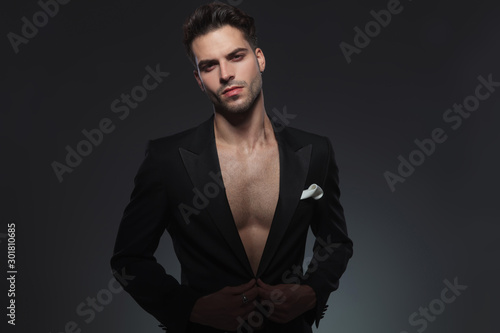 young fashion man adjusting jacket © Viorel Sima
