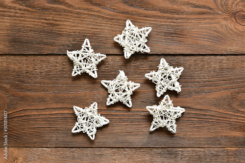 White decorative Christmas stars flat lay abstract background.