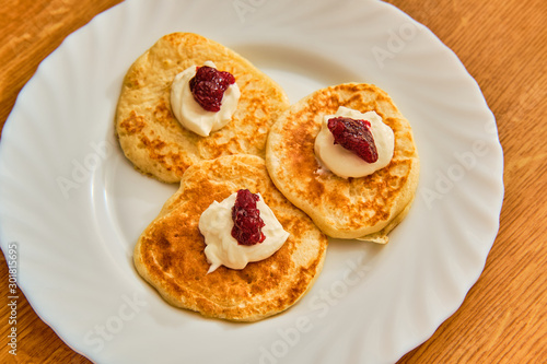 Pancakes on white plate