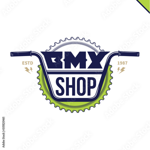 Vector bmx bike shop logo on a blue-green background