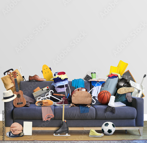 Large leather sofa with a bunch of different things