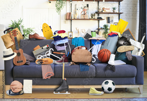 Large leather sofa with a bunch of different things photo
