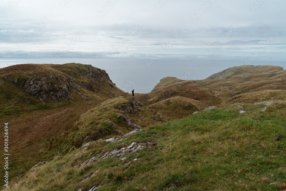 lonely tourist walks in the mountains of ireland on the ocean lonely tourist walks in the mountains of ireland on the ocean
