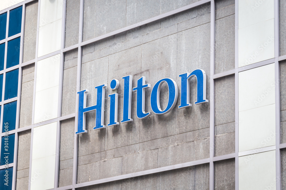 NEW YORK, USA - 17 MAY, 2019: Hilton hotels and resorts logo on the  building of Hilton in New York USA Stock Photo