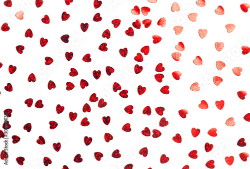Red hearts confetti isolated on white. Valentine's day background with hearts