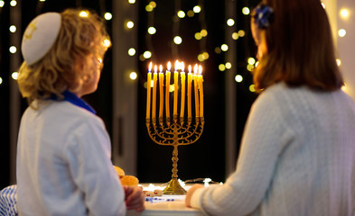 Kids celebrating Hanukkah. Festival of lights.