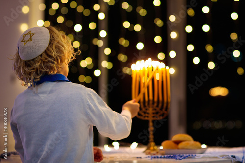 Kids celebrating Hanukkah. Festival of lights. photo