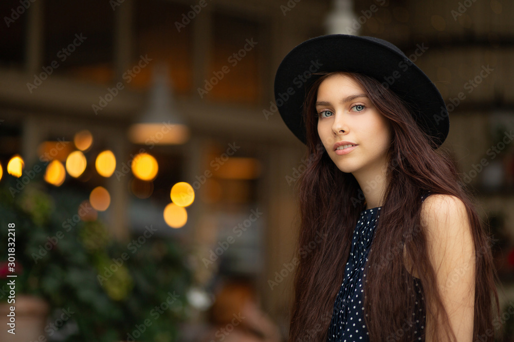 Pretty girl with long hair wears hat Pretty girl with long hair wears hat