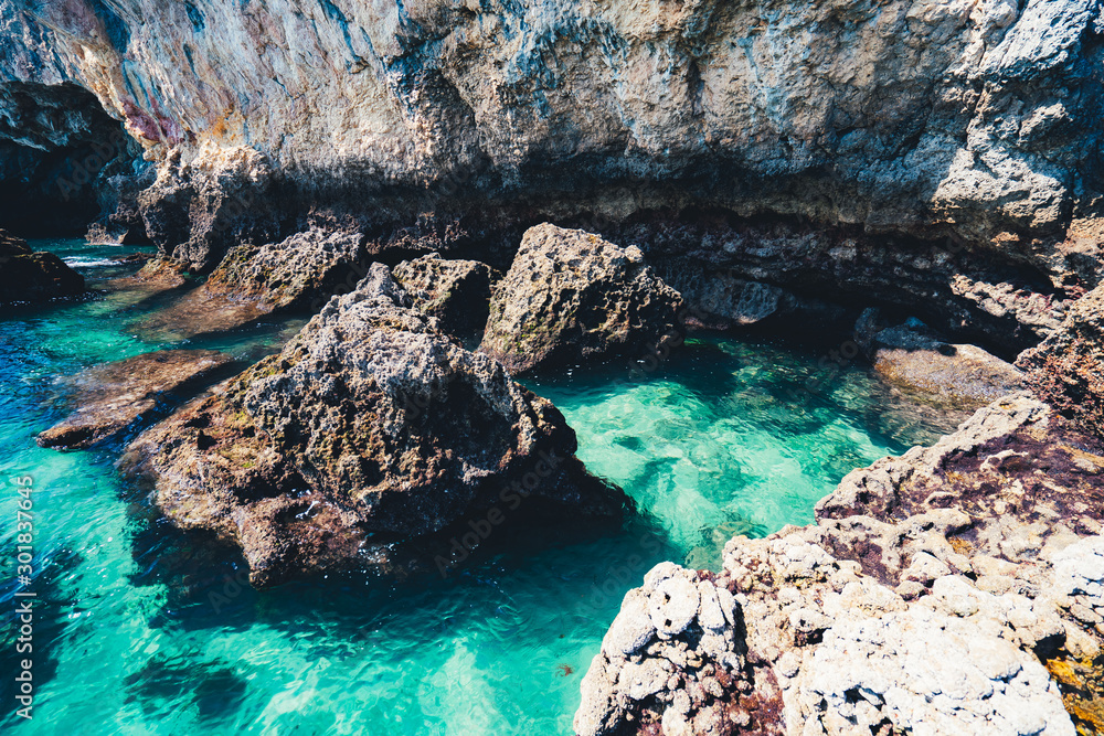 Portuguese cove with turquoise sea and rocks
