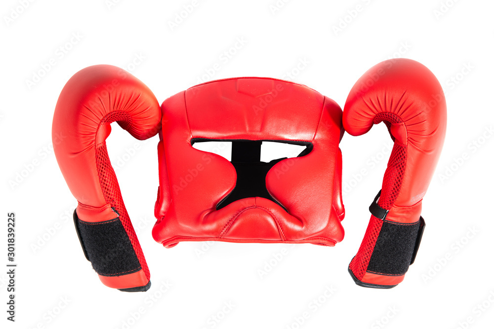 Boxing helmet and boxing gloves isolated on white. The concept of sport and active leisure. Equipment for boxing, kickboxing. Playing sports, taking care of your figure, fight and self-defense.