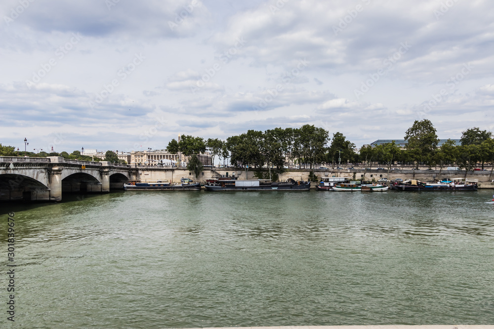 Pont de la Concorde and houseboats on the Seine River, Paris