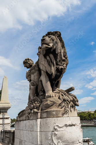 The lion sculpture by Georges Gardet on the Pont Alexandre III, Paris