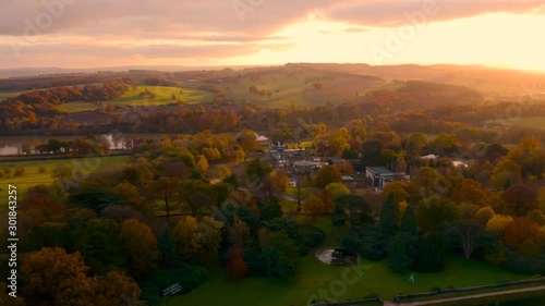 Aerial footage of Autumn Fall colours at Sunset around a Bretton Hall, a beautiful Georgian Country House near Wakefield, UK