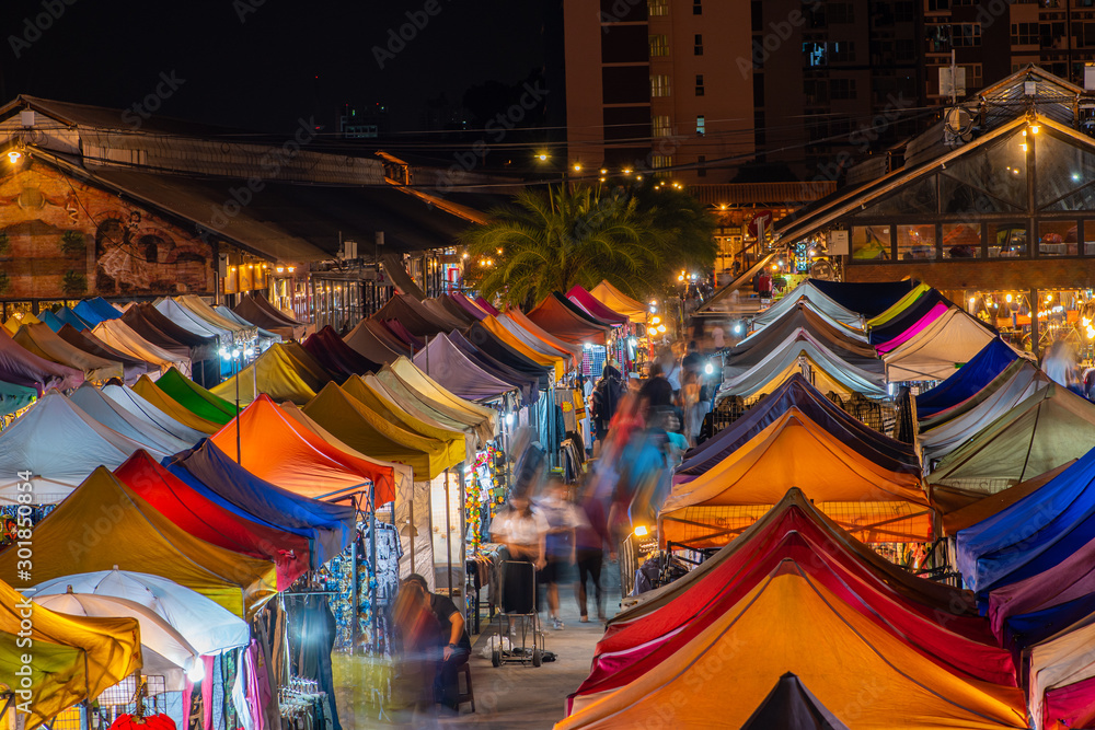 Naklejka premium Night view of variegated Train Night Market at Ratchada. Thailand