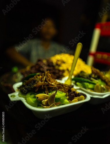Fotografie Traditional Burmes food at night market. Yangon, Myanmar