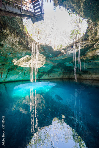 Konstfotografi Amazing Noh mozon cenote with turquoise water and roots, Pixya, Yucatan, Mexico