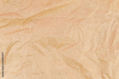 Top view brown Crumpled baking paper background texture