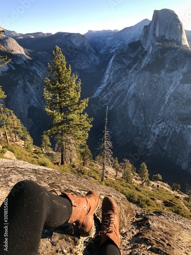 Boots and view of half dome Yosemite national park