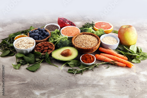 Wallpaper Mural Healthy food clean eating selection: fruit, vegetable, seeds, superfood, cereals, leaf vegetable on rustic background Torontodigital.ca