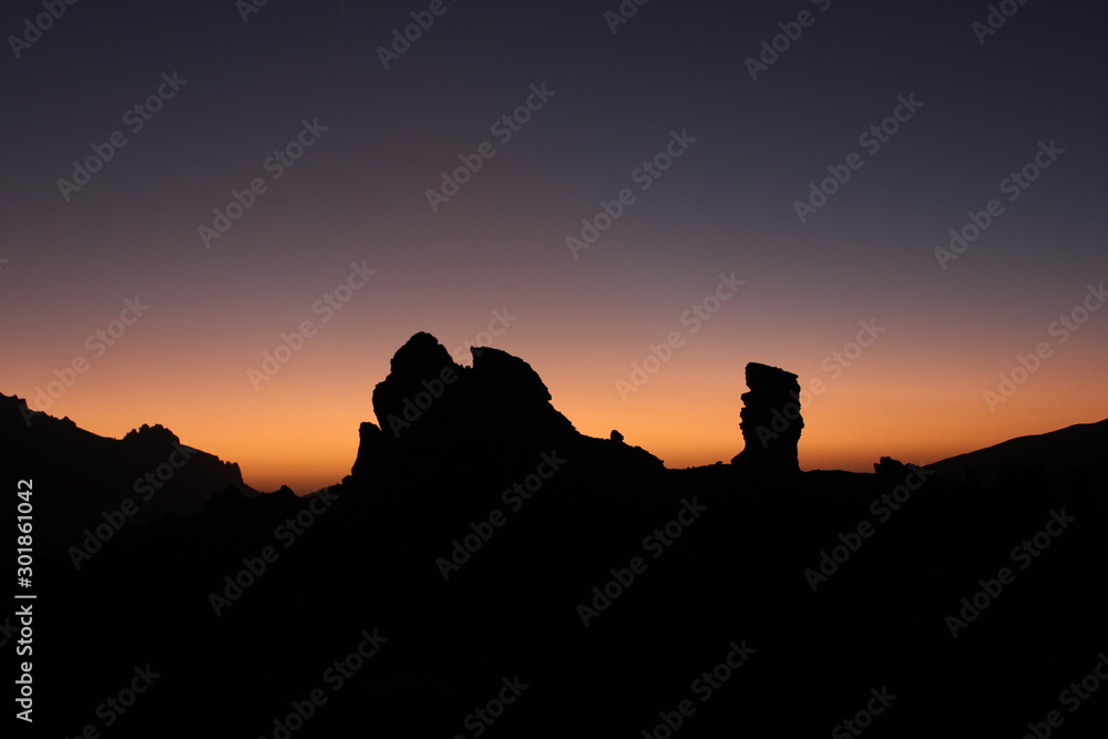 Mountains silhouette on sunset background